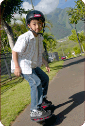 boy riding bike in Traditions park